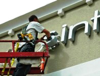 Servicing of signboard
